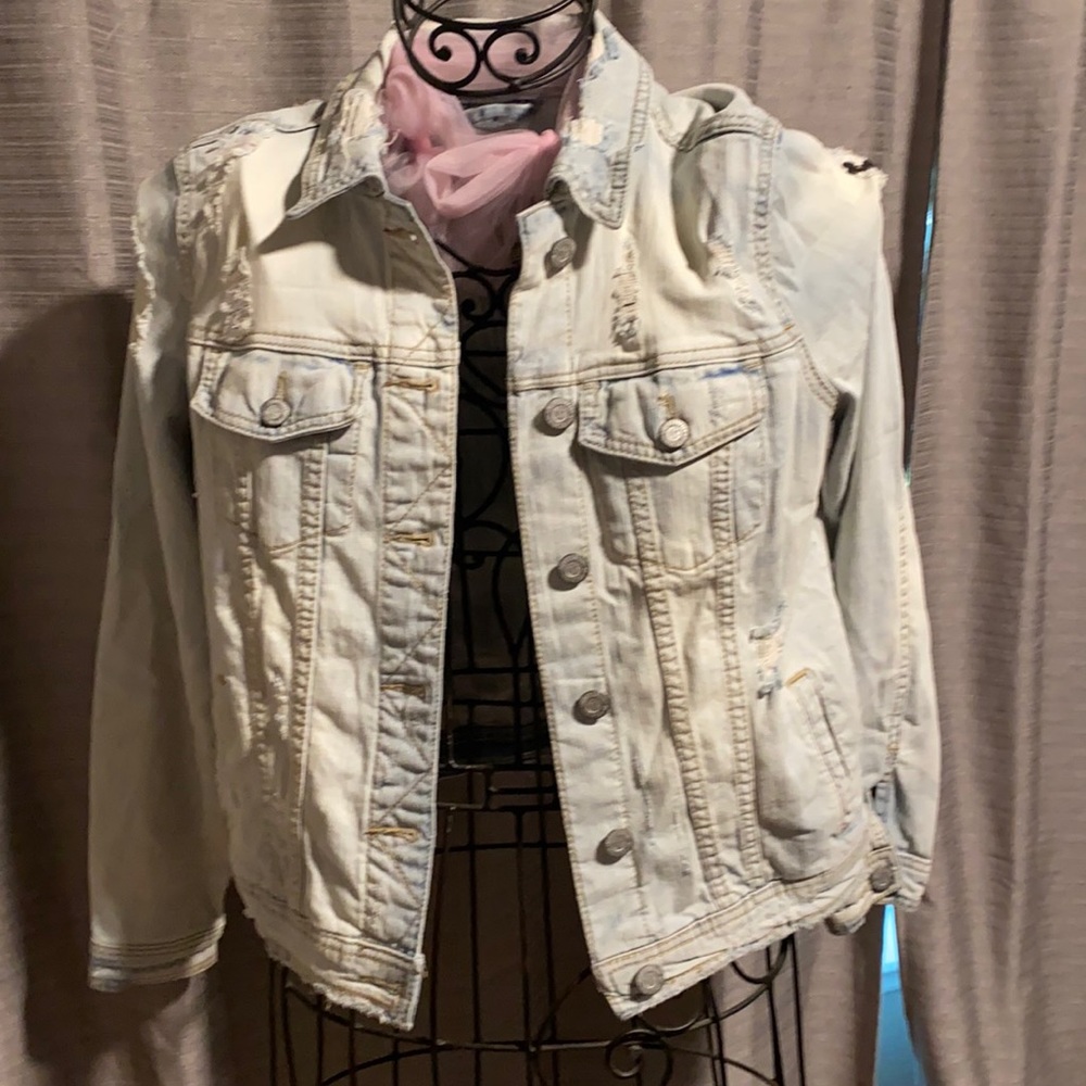 Distressed jean jacket